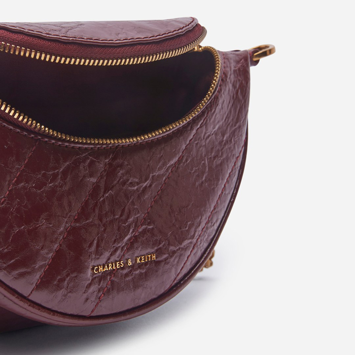 charles and keith wrinkled effect saddle bag